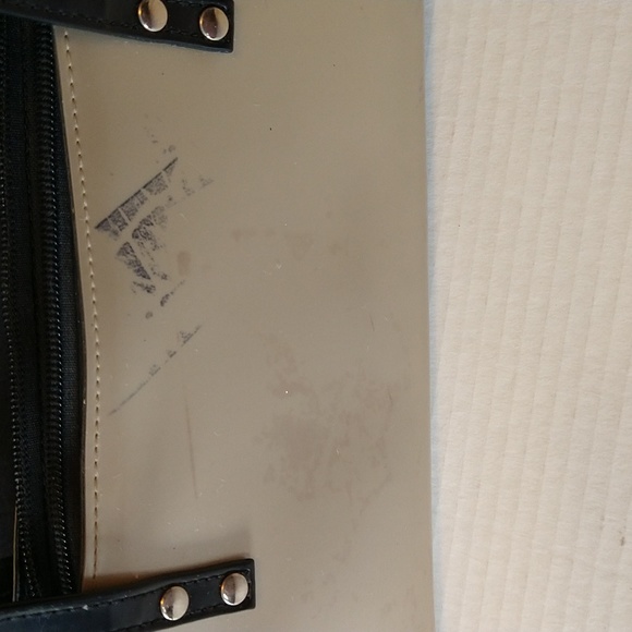 Beijo a pearlized gold color with black straps and trim. - Picture 3 of 14